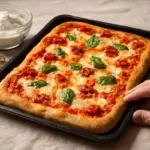 Pizza in teglia fatta in casa: quale farina usare per ottenere la giusta morbidezza?